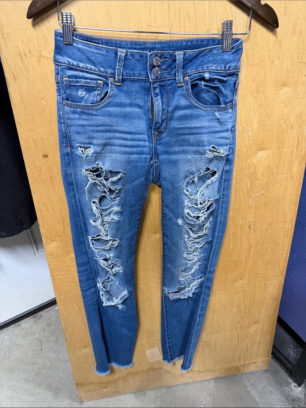 American Eagle Outfitters Distressed Skinny Jeans in Medium Blue